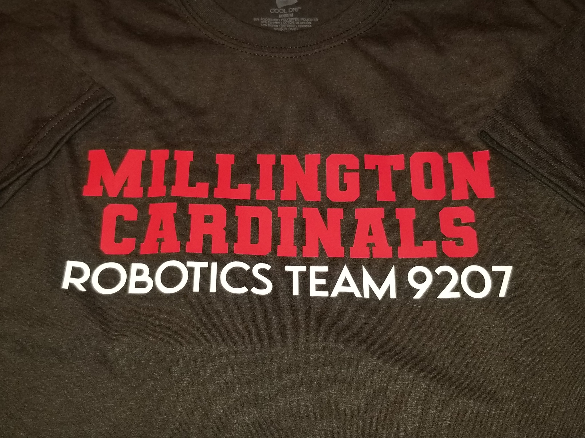 Millington robotics students and mentors with their competition robot